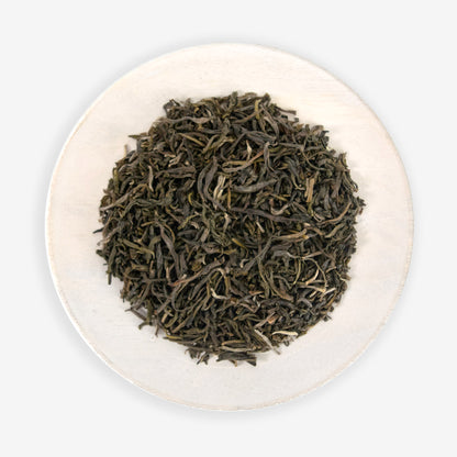A plate of dried green tea leaves.